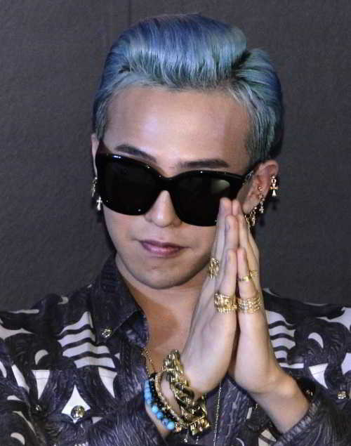G-Dragon of South Korean band "Big Bang" gestures during a pre-concert news conference in Singapore